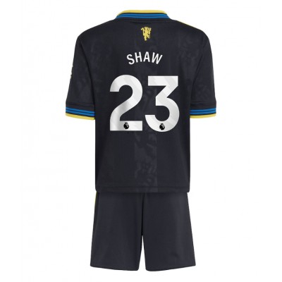 Fotbollströjor Barn Billiga Manchester United Tredjeställ 2025/26 Luke Shaw 23