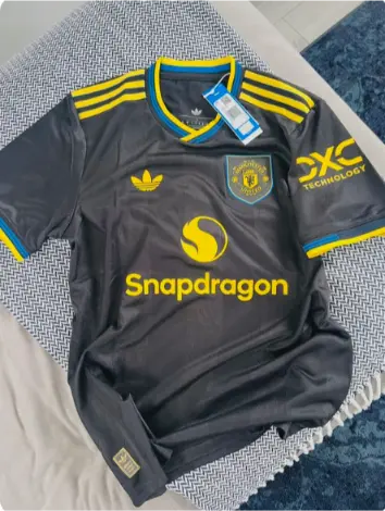 Billiga Fotbollstroja Dam Manchester United Tredjetroja 2026 Kortarmad.webp